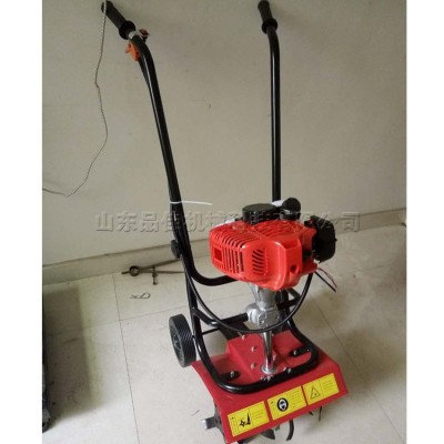 田園管理農(nóng)用松土翻土機(jī) 二沖程便攜式微耕機(jī) 汽油小型土壤松土機(jī)