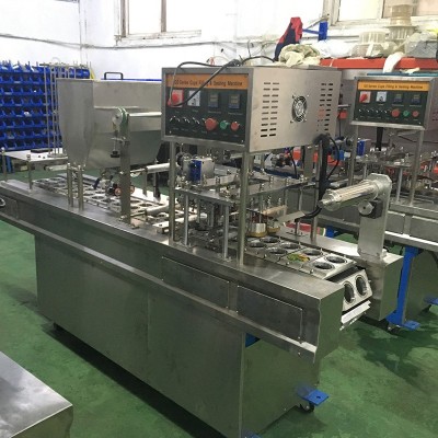 一出二機械式灌裝封口機 羊肉卷盒裝封口機 餐盒包裝封口機